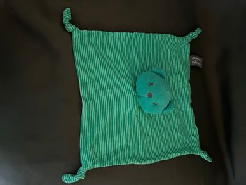 Doudou orchestra ours plat vert 4 noeuds