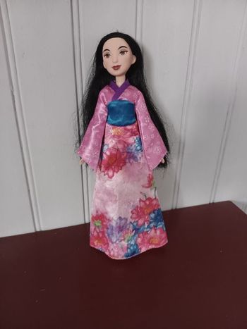 Mulan barbie poussière d étoile.