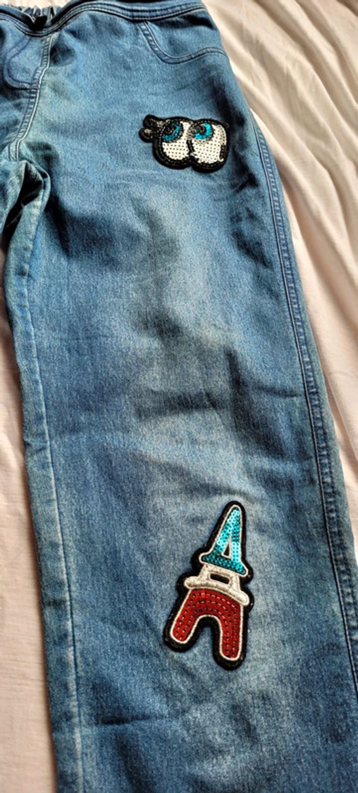 Jean bleu Calzedonia Taille S écussons sequins - photo numéro 5