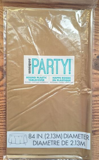 Nappe ronde fine dorée 213 cm de diamètre. Pour fête de Noël