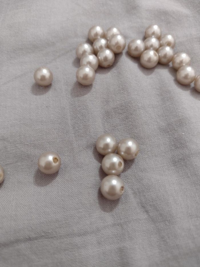 Lot de 26 perles beige rosé