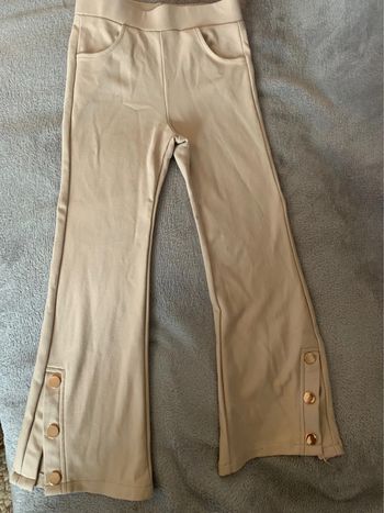 Pantalon detail bouton doré