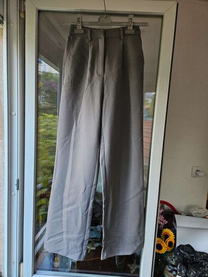 Pantalon à jambes larges gris pimkie taille 32