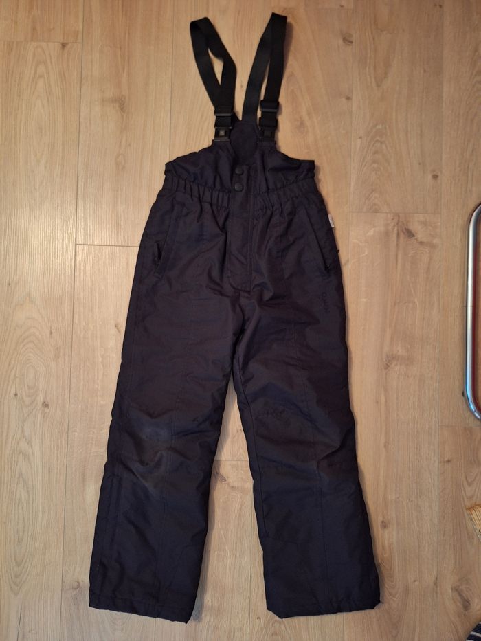 Salopette de ski 140cm 10 ans Etirel excellent état noir à bretelles et fermetures éclair, 2 poches