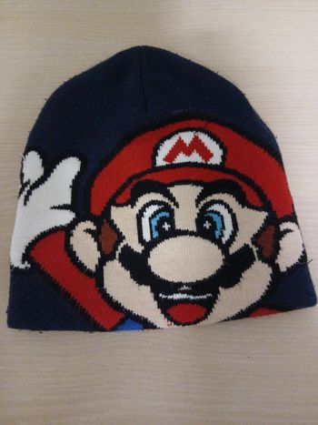Bonnet  mario taille 2/4  ans matiere coton,polyster tres bonne etat
