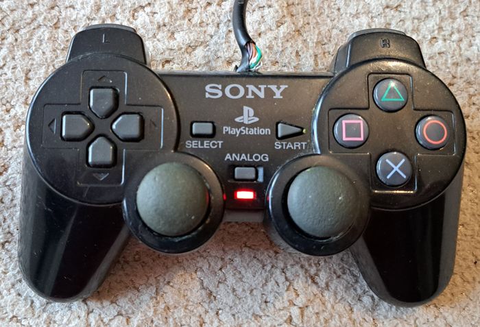 🎮 Manette officielle DualShock 2 noire Sony PlayStation 2 PS2