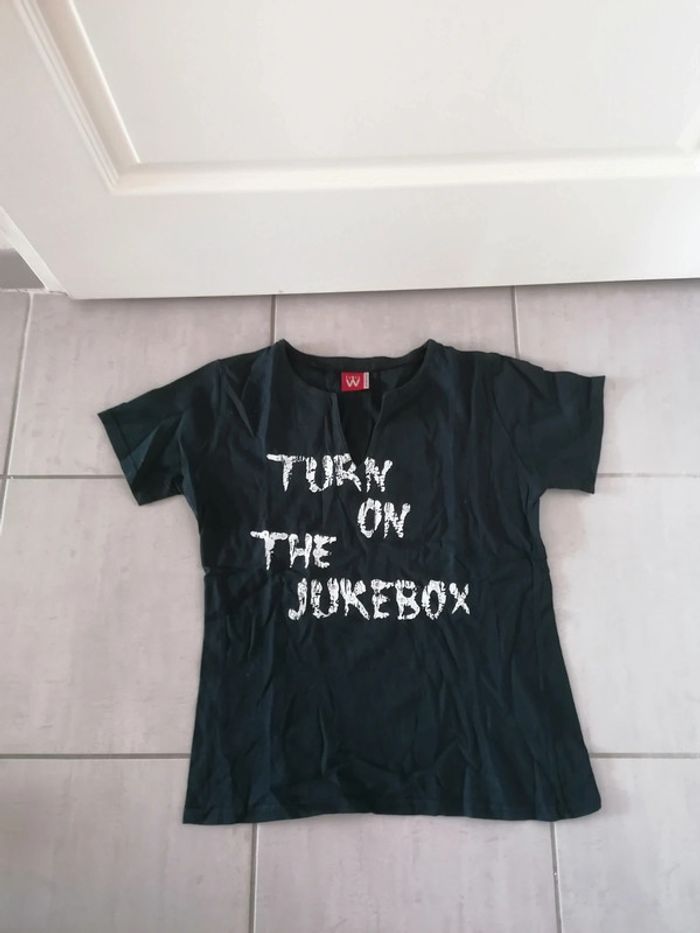 Tee-shirt très peu porté comme neuf taille 42/44 - photo numéro 2