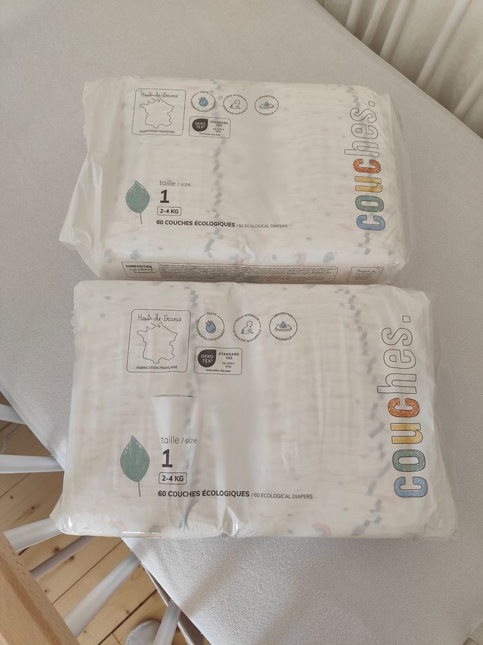 Couches taille 1 la marque en moins. Neuves