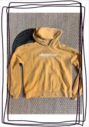 Sweat moutarde shoppeuse
