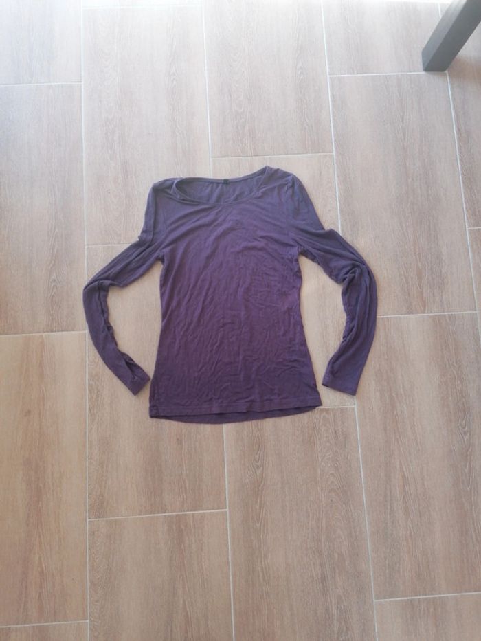 Maillot violet taille 1. 34