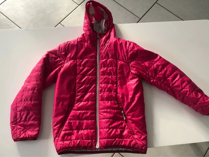Doudoune rose quechua taille 8ans