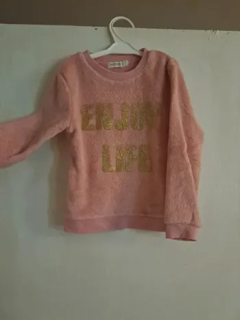 Pull rose et doré orchestra