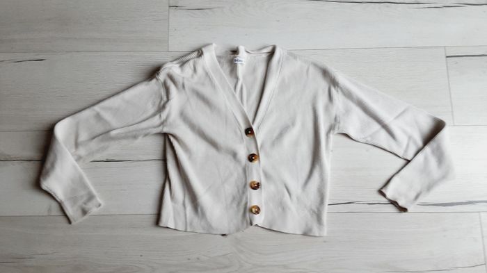 Vêtement fille gilet crème court Gémo 14 ans