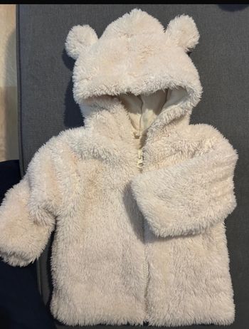 Manteau fausse fourrure