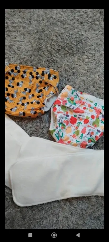 Lot de deux couches lavables et Insert neuve jamais porté