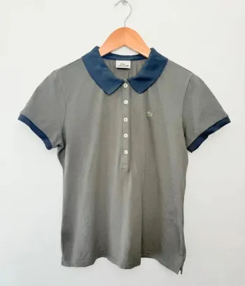 Polo Lacoste femme gris et bleu taille 44 soit L très bon état