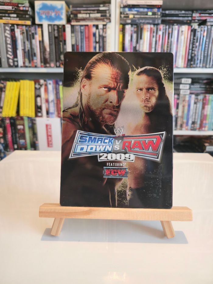 Jeu XBOX 360 avec Steelbook Smack Down VS Raw