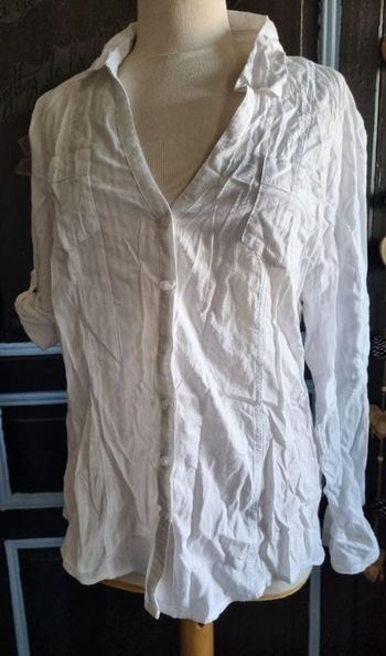 Chemise blanche transparente manches retroussable 48