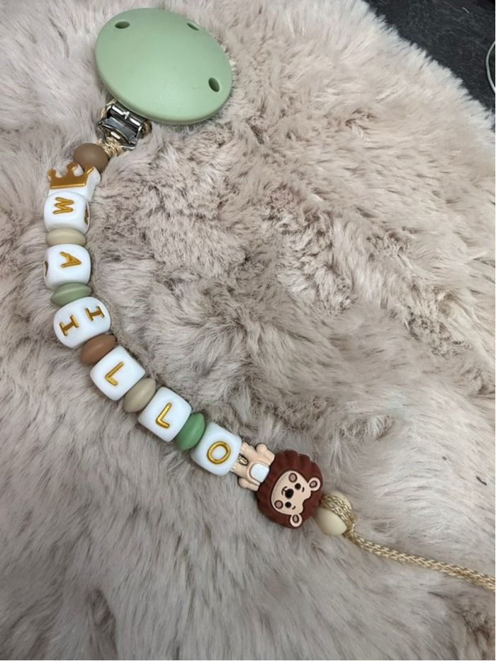 Attache tétine lion