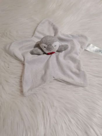 Doudou plat étoile tête de pingouin obaibi 
