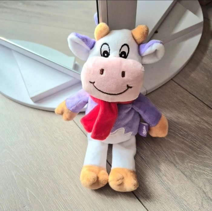 Très jolie peluche Milka. Très douce .Neuve. 24 cms