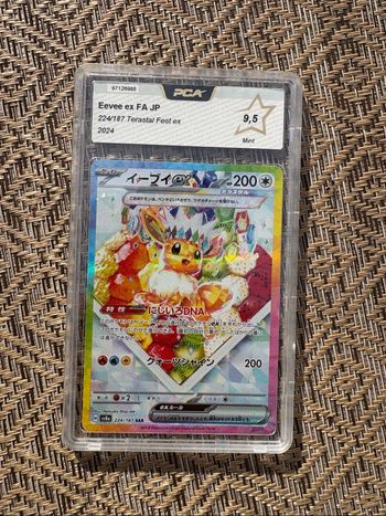 Evoli / Eevee PCA 9.5 224/187 SAR TERASTAL FESTIVAL, en édition limitée et en parfait état.