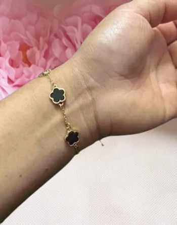 Bracelet doré avec des trèfles noirs acier inoxydable