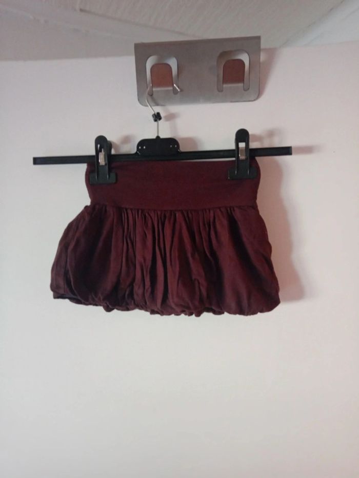 Joli mini jupe brune. 8 ans