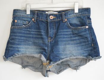 Short en jean Mango Denim&Tees taille 34 – coupe courte – bords effilochés
