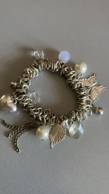 jolie bracelet avec breloques élastique acier