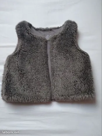 Veste sans manche en fausse fourrure