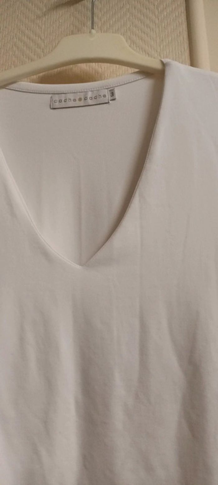 Haut moulant taille M. 1,5€. - photo numéro 4