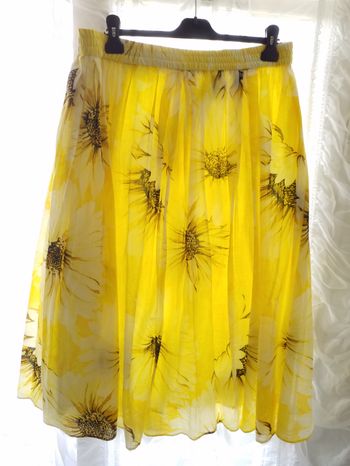 Jupe imprimé avec  doublure taille élastique     L     neuve