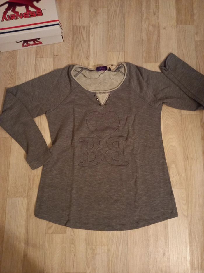 Haut de maternité épais en excellent état