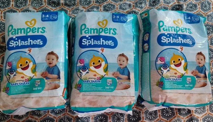 3 Paquets de couches de bain  NEUFS