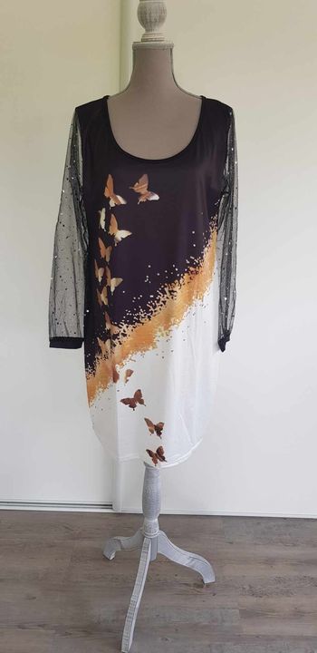 Robe manches transparentes à paillettes