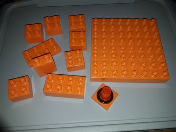 1 plaque et pièces  duplo orange