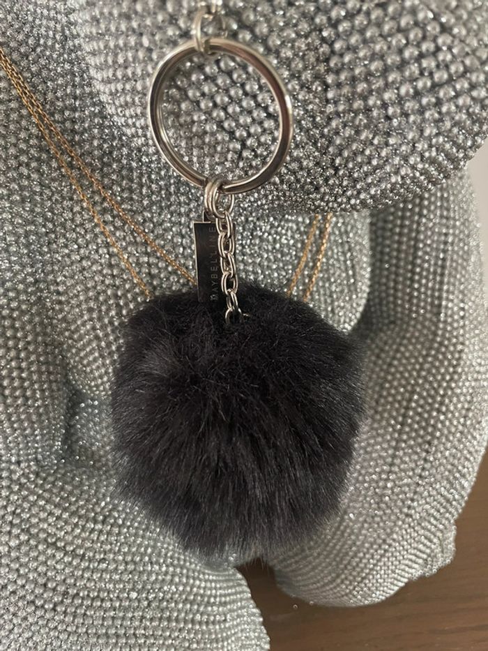 Porte clefs pompon noir fausse fourrure  maybelline état neuf - photo numéro 2