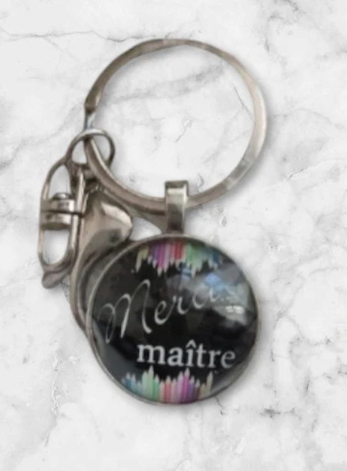 Porte clé "merci maître"