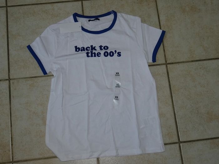 tee shirt neuf 14 ans