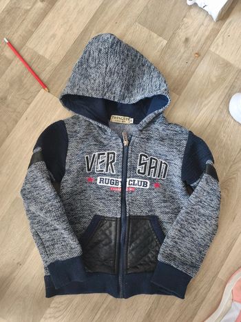 Gilet zippé taille 8 ans  marque tweng stn