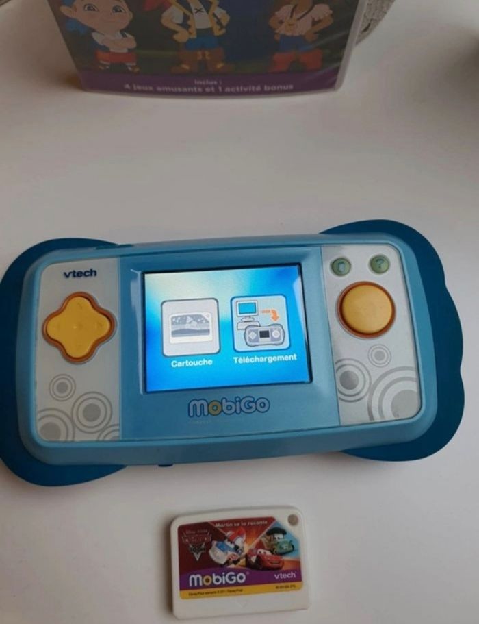 Console Mobigo vtech bleu + 4 jeux en très bon état - photo numéro 3