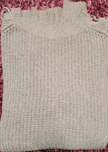 Pull avec manches semi ouvertes