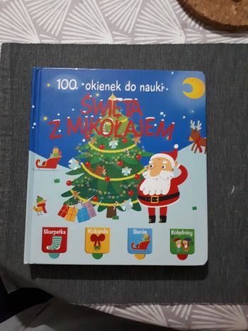 Livre polonais enfants Smeta avec le Père noël