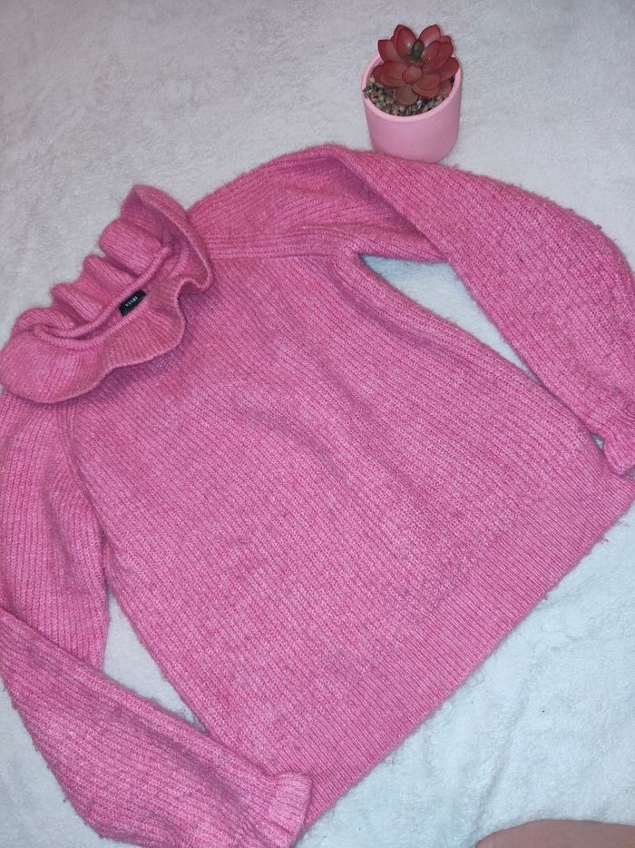 Pull rose à col roulé fille