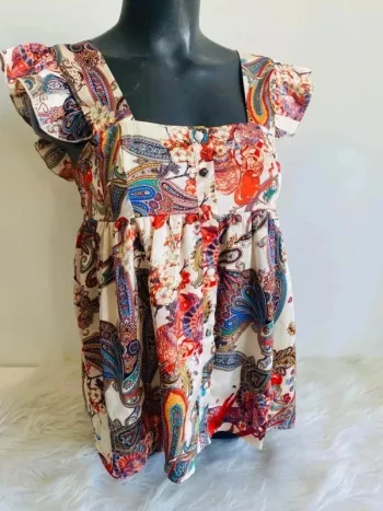 Blouse top type péplum femme taille 36/38 effet satiné