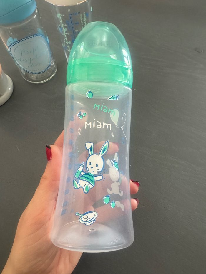 4 biberons neufs + 1 doseur de lait - photo numéro 5