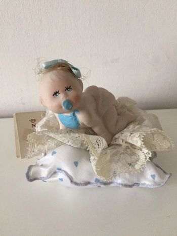 Poupon de porcelaine