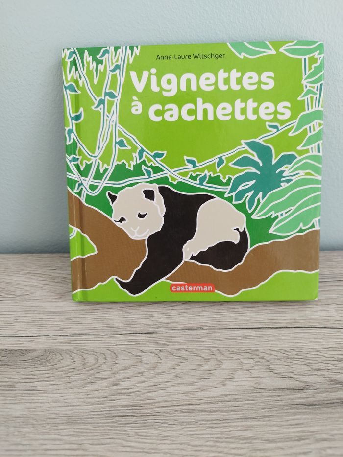 Livre vignettes à cachette