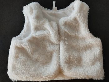 Boléro fourrure taille 24 mois